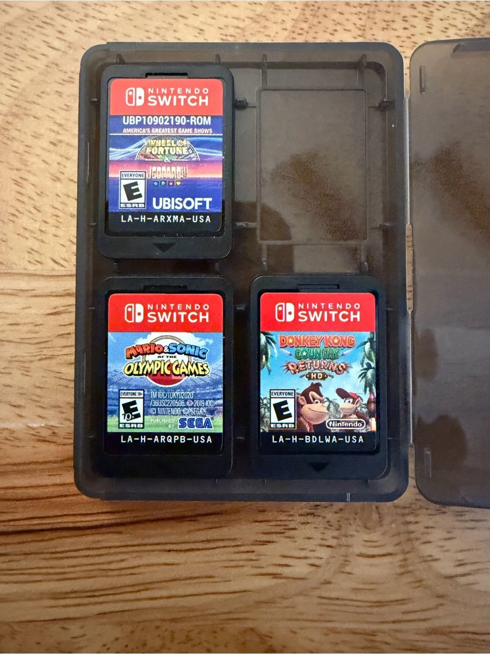 Nintendo Switch Lite w/ Charger, Console Case, Travel Case + 7 Games & MicroSD